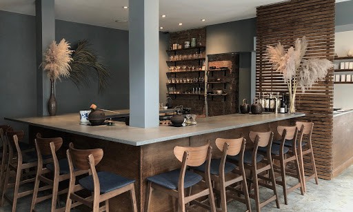Inside of 29B tea house, showing counters and bar chairs