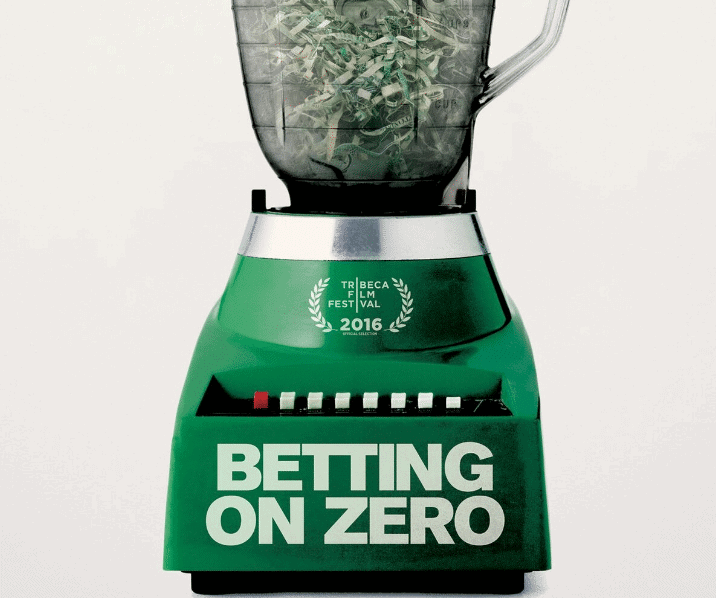 Green blender that says words in white: BETTING ON ZERO, money inside the blender