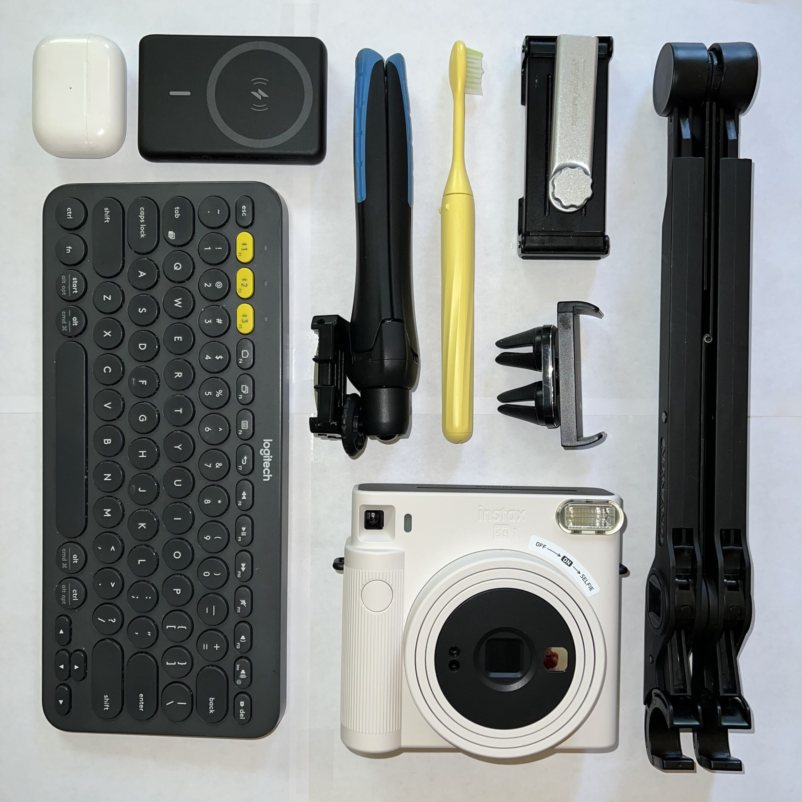flat lay photo of travel gears