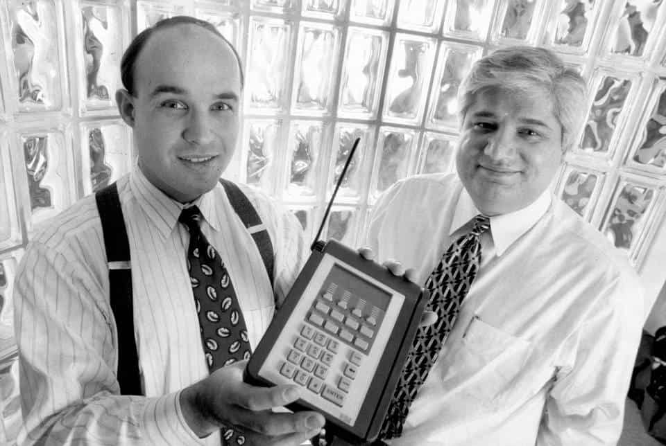 two Research In Motion founders, black and white picture, they're both wearing ties