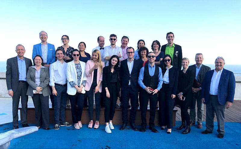 Group shot of the students and the Monaco Impact team and Nick Gray