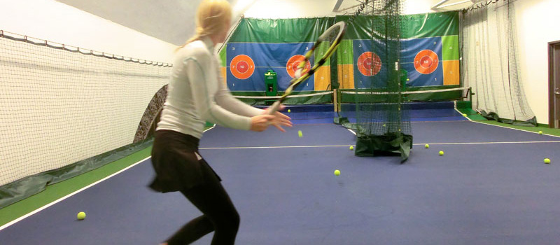 There are two practice lanes upstairs, each with a ball return machine.