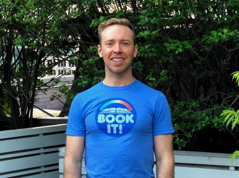 White guy with blonde hair (me) wearing a blue Book it! t shirt from Pizza Hut