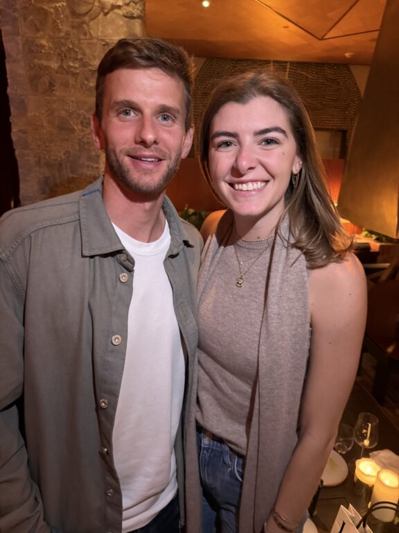Man and a woman smiling