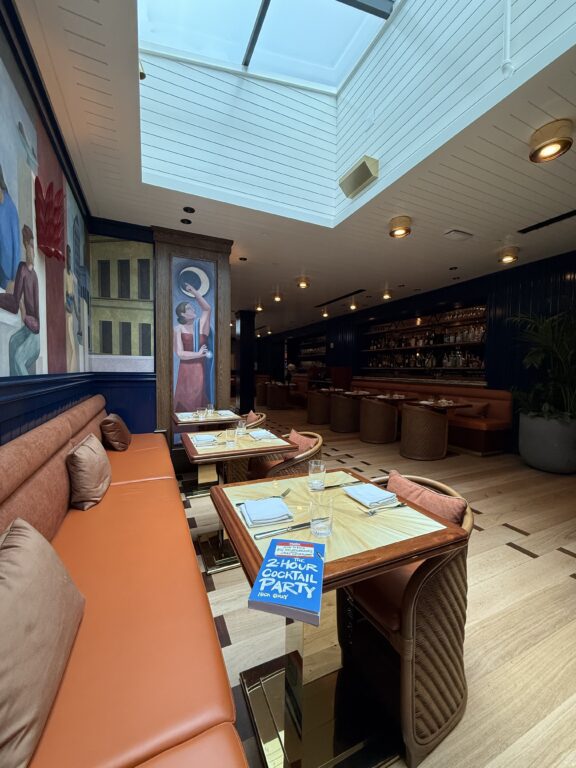 Picture of room and a book on a table