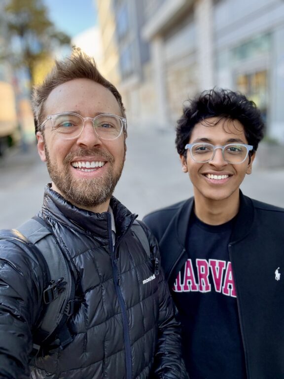 Two people smiling