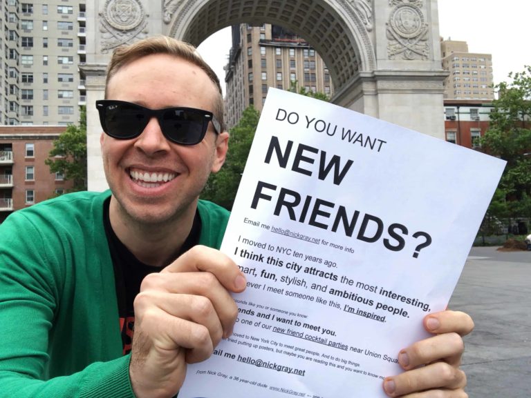 Me in Washington Square Park showing the poster that would be printed, laminated, and shared across NYC.
