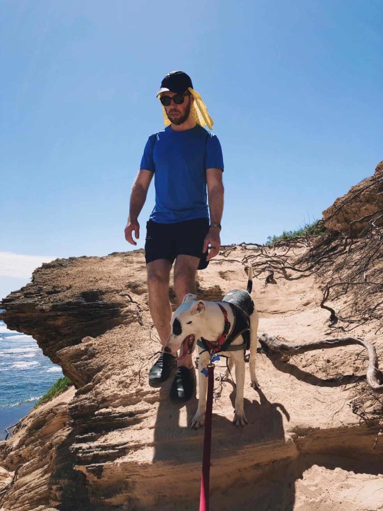 Nick Gray and shelter dog at the Humane Society in Kauai, Hawaii