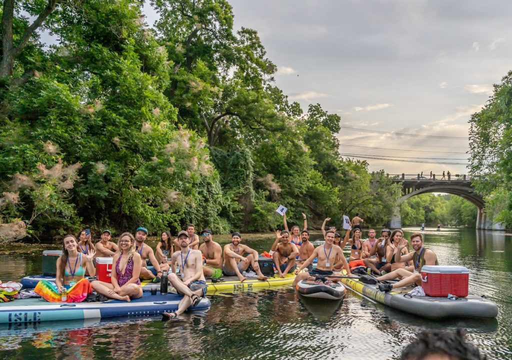 My friends and I on Barton Creek floating on large paddle boards.