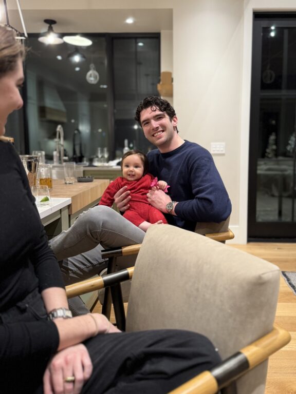 man holding a baby