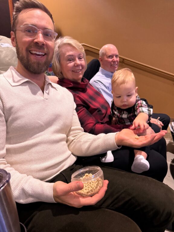 people smiling and a baby