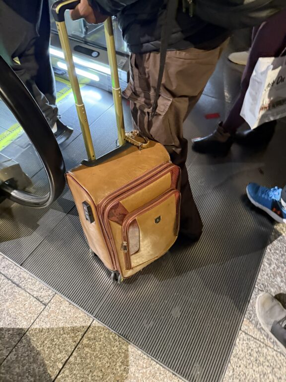 yellow leather suitcase