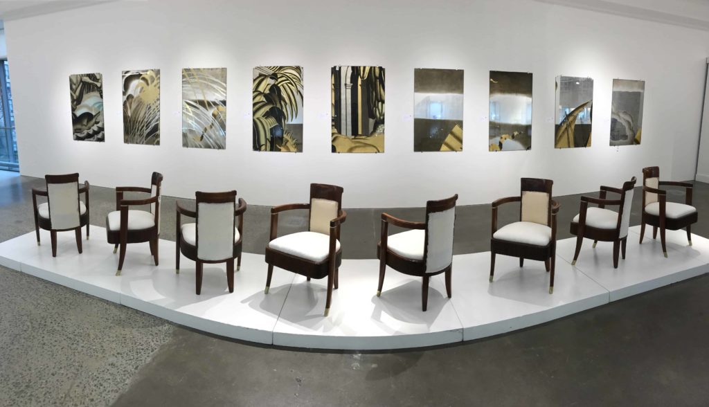 Jean Dupas paintings from mural on a white wall