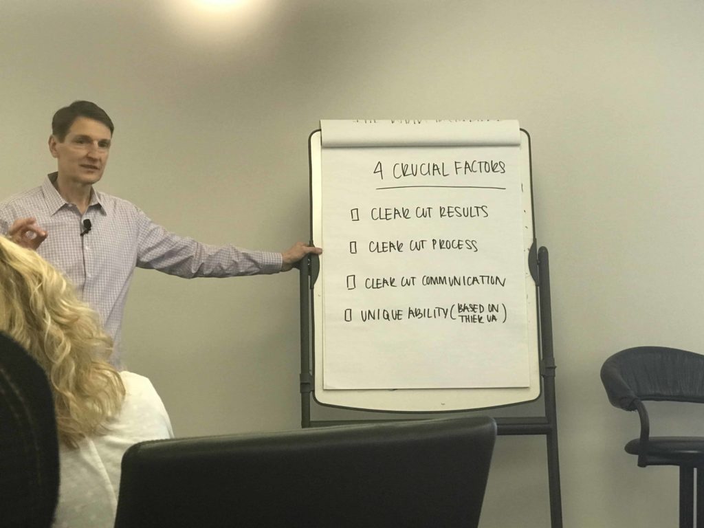 Gary pointing to handwritten notes
