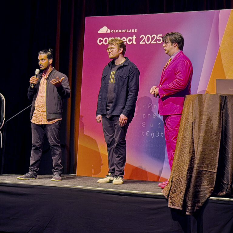 Alex Krivit (PM), David "Tubes" Huber (Director, Product Management), and Sachin Fernandes (Engineering Manager) at the Cloudflare Connect 2025 partner and customer summit