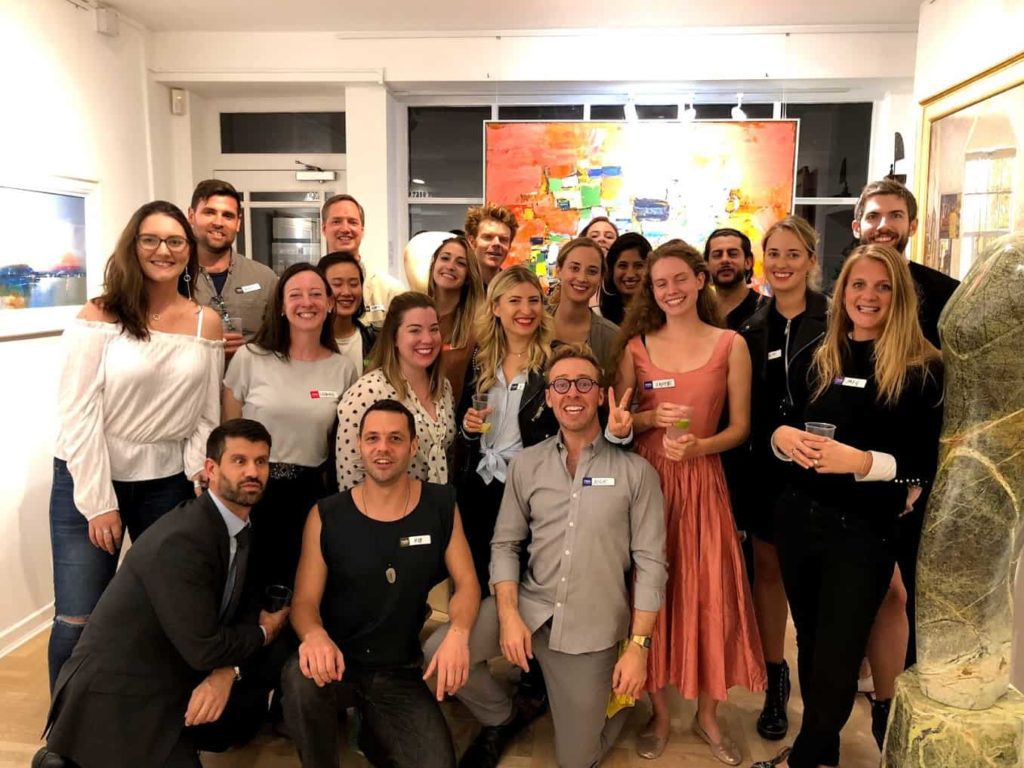 People in an art gallery for a cocktail party in London