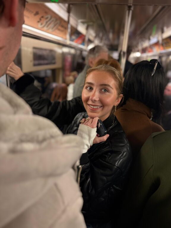 Girl smiling in train