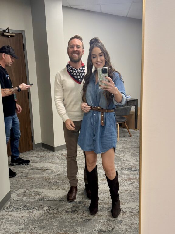 mirror selfie of a man and a woman