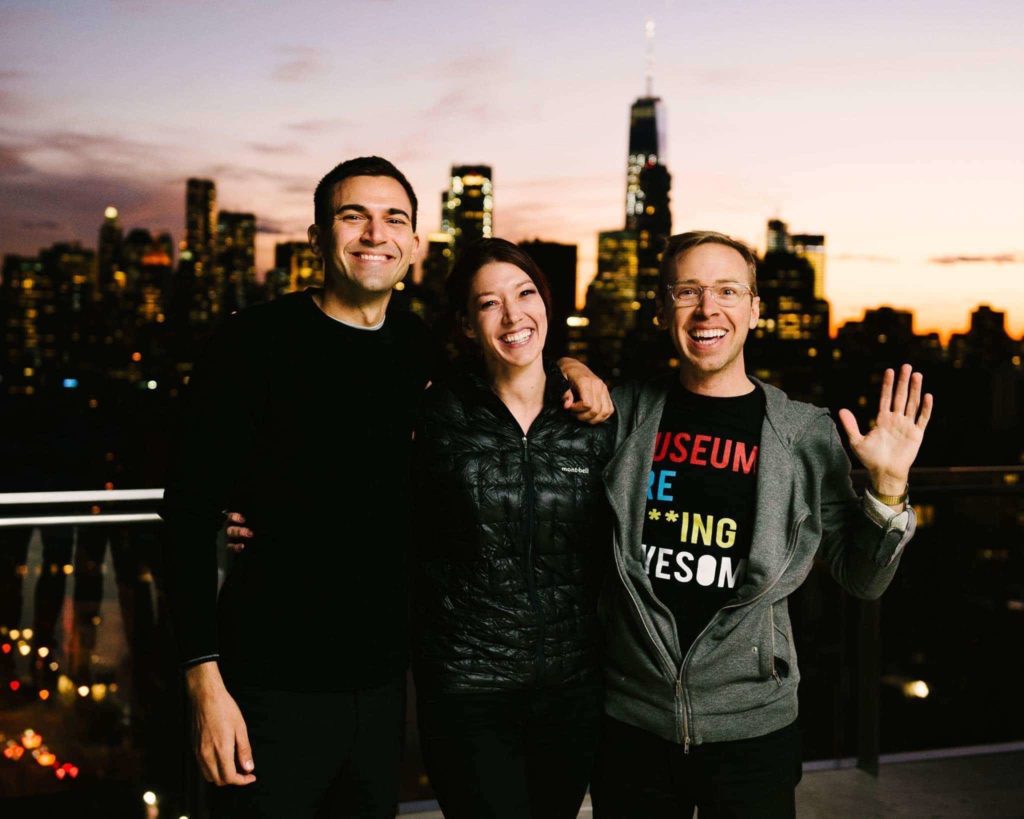 three people on rooftop