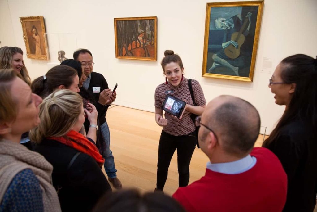 Private museum tour guide in Chicago talks to guests