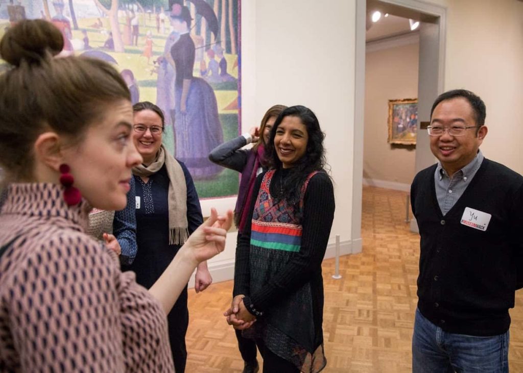 Private tour guide at a museum in Chicago leading a small group