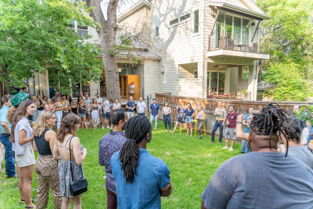 Group standing in a circle outside