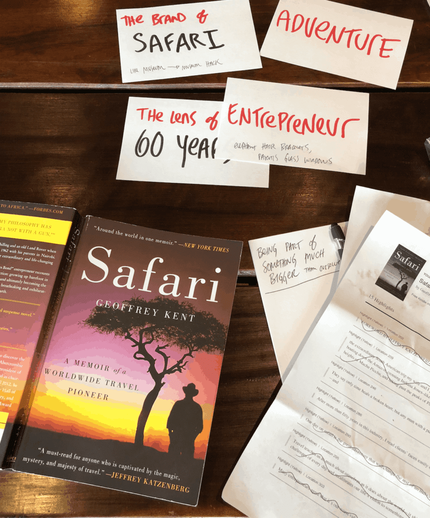 Cards and books on a table with large marker handwriting
