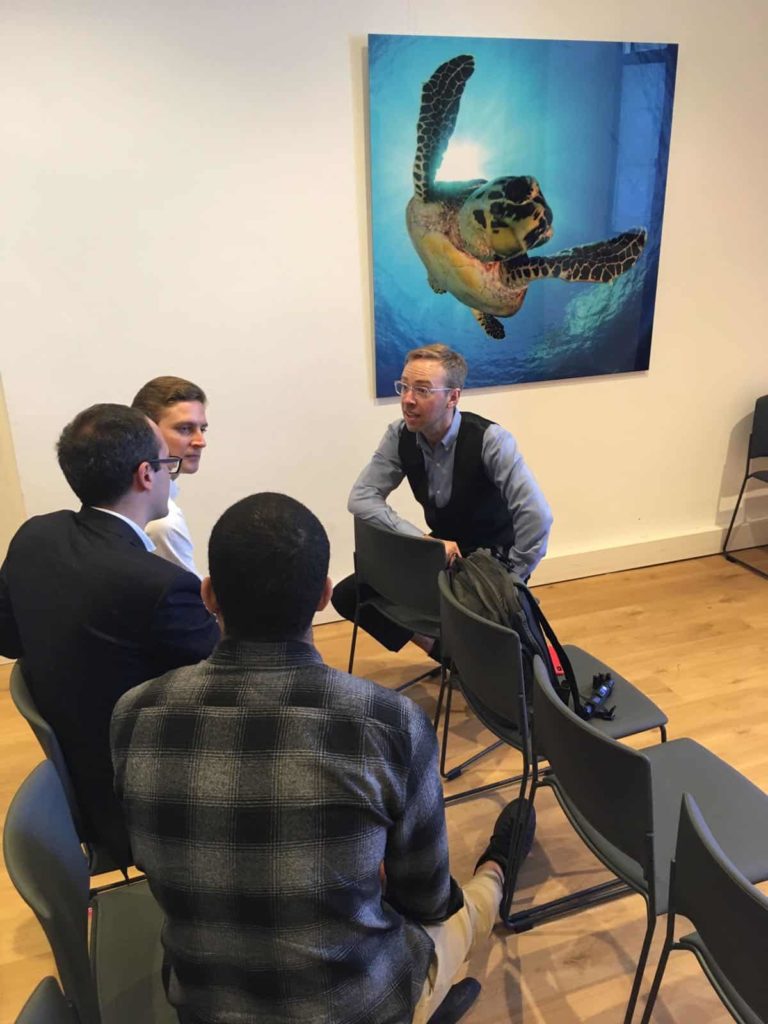 Nick Gray talking with the students about museum consulting