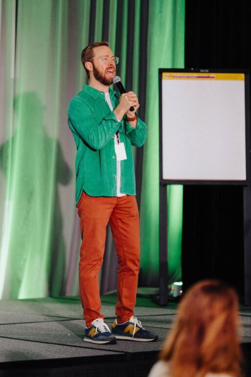 Speaking on stage at GoBundance