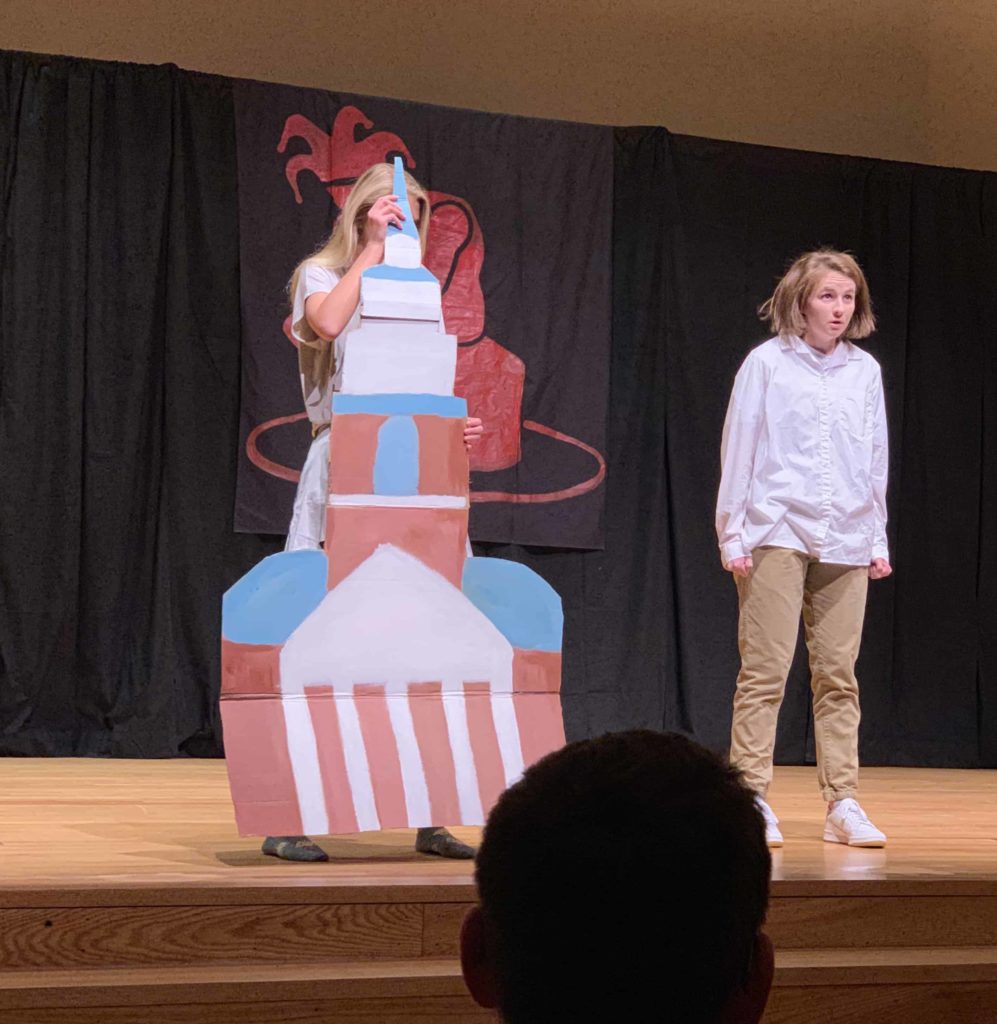 Cardboard painted version of Wait Chapel on stage of a Lilting Banshees show
