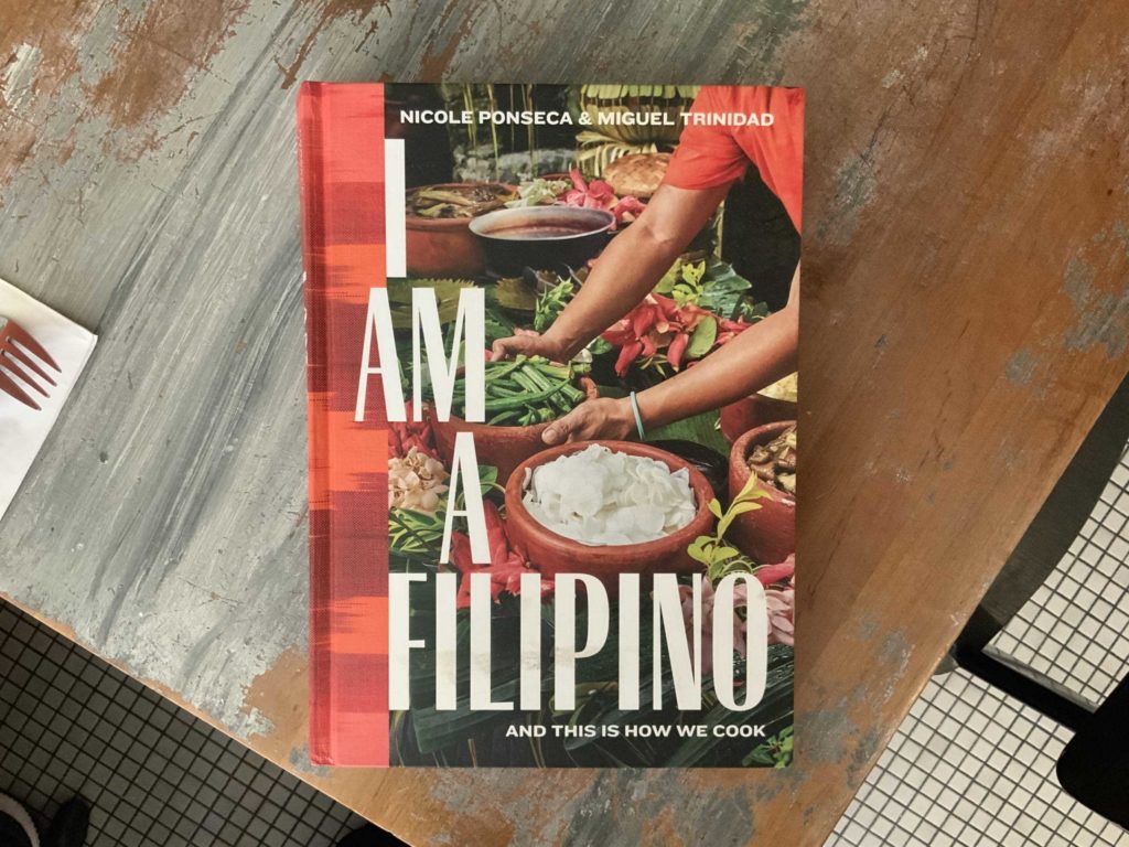 The cookbook "I Am a Filipino: And This Is How We Cook" by Nicole and Miguel
