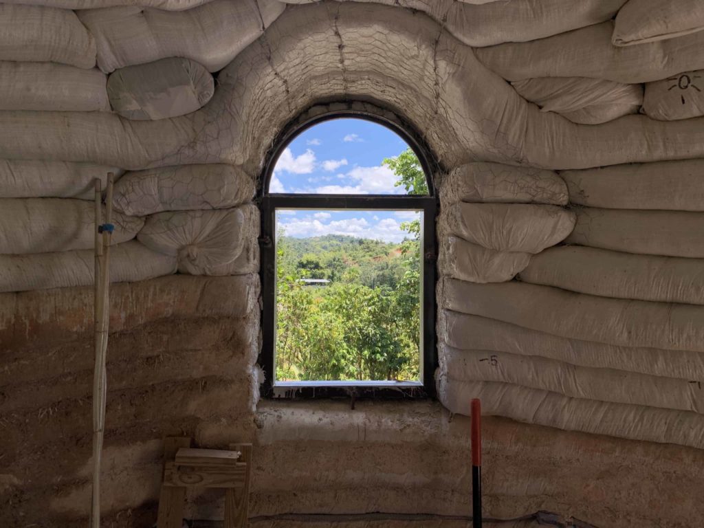 Looking outside of a window, from inside the house