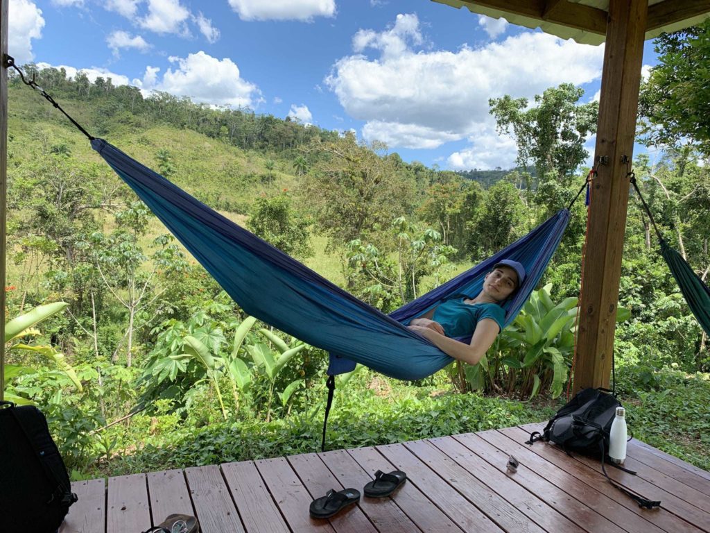 Woman relaxing in a hammock