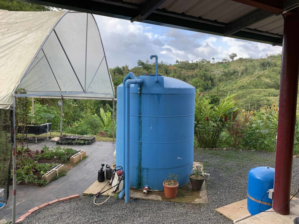 Large blue plastic tank