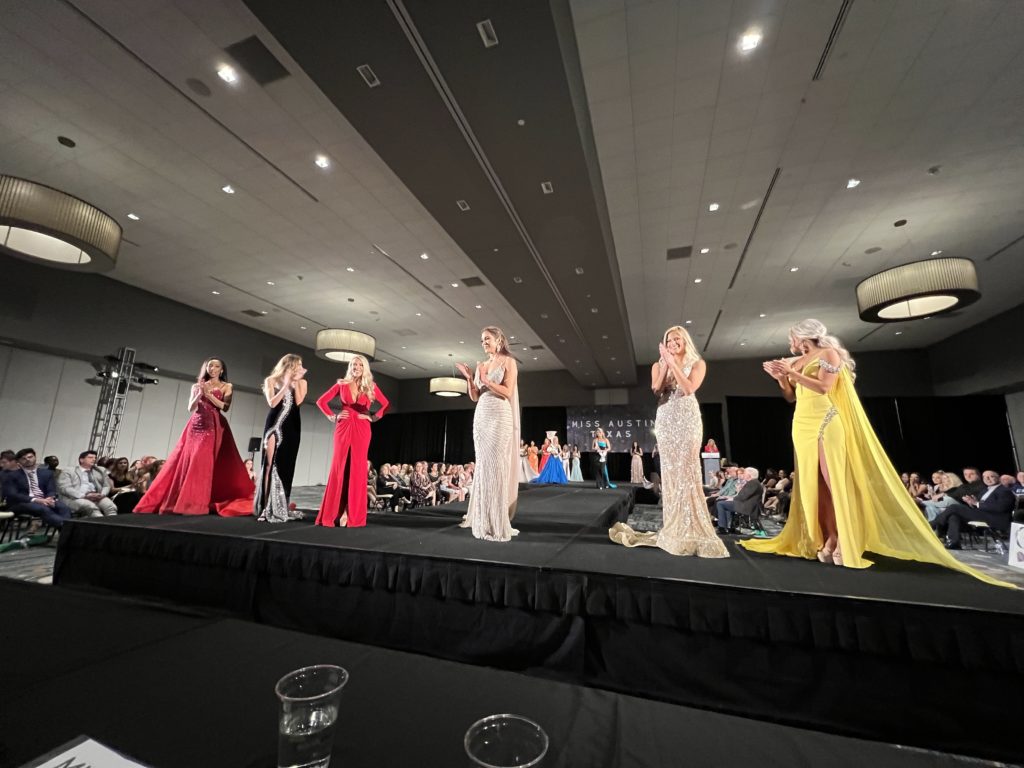 beauty pageant contestants cheering