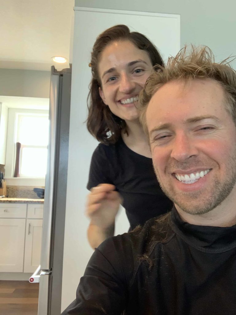 Nick and Rachel smiling during quarantine haircut