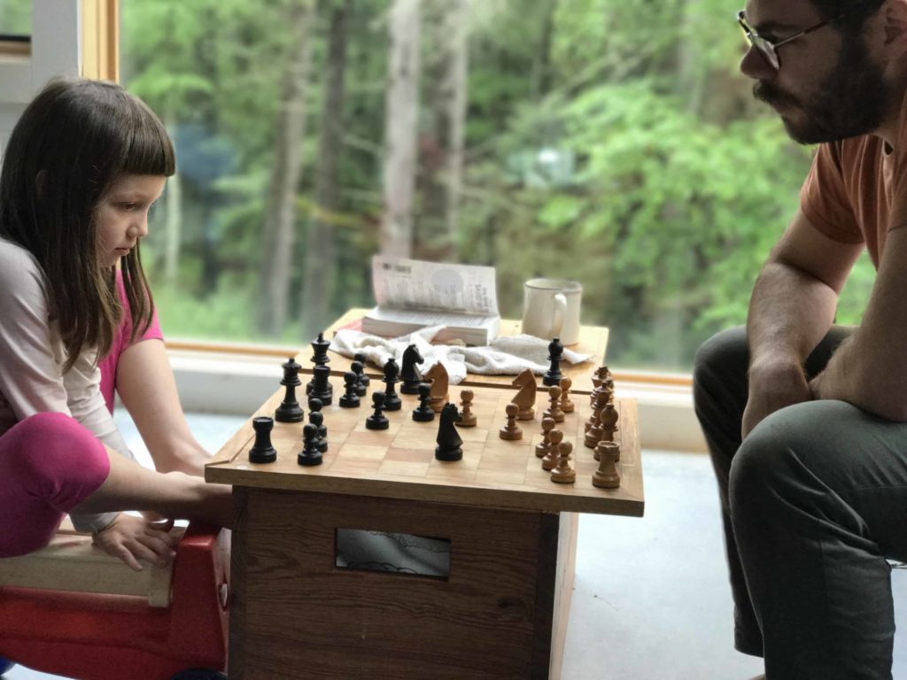 two people playing chess at Beaver Brook