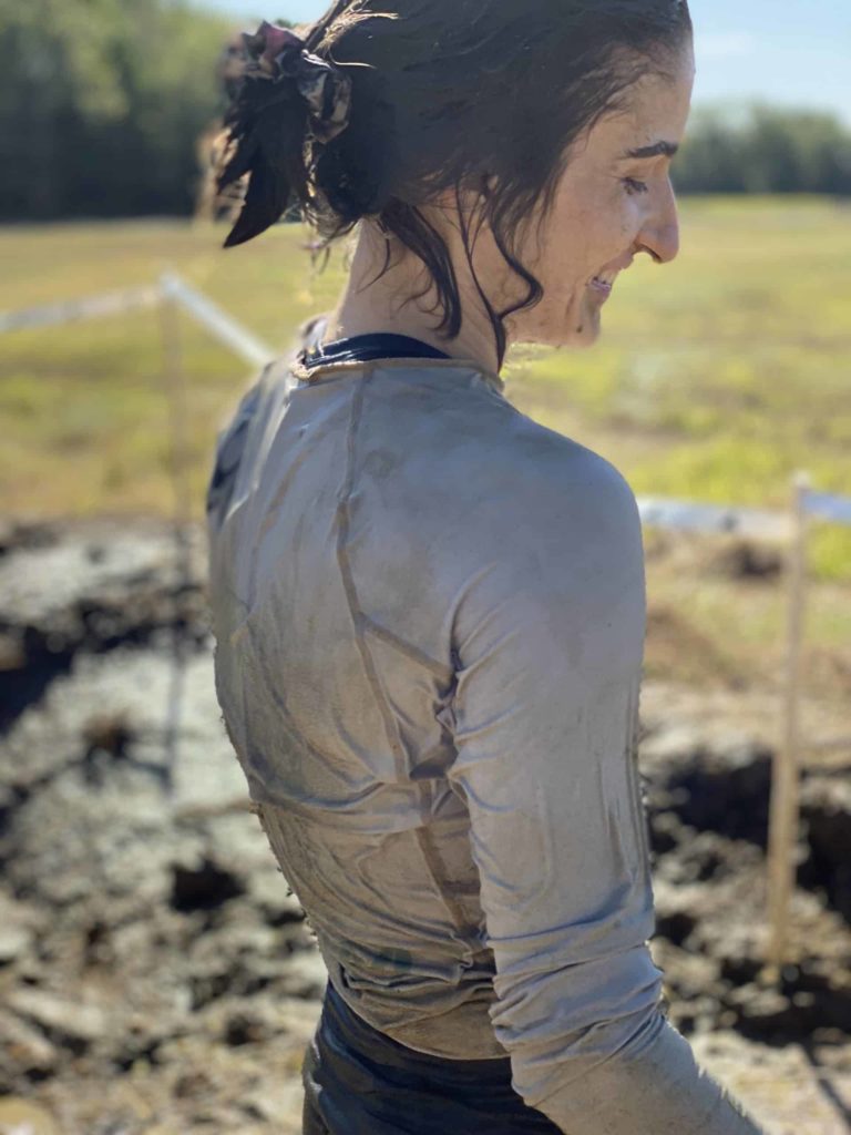 Rachel wet after a slide obstacle at Goliathon