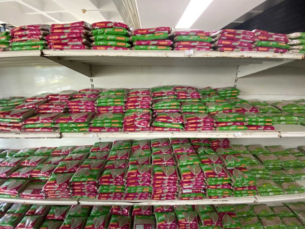 Shelves with bags of beans