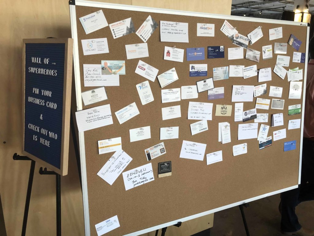 Cork board with many business cards