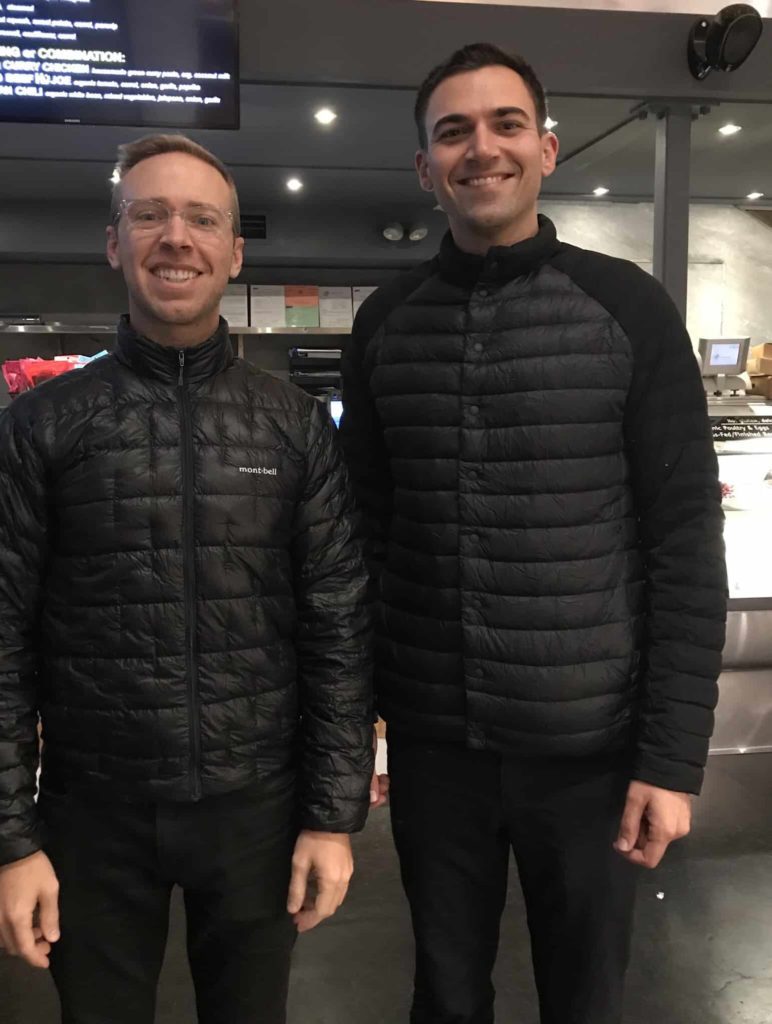 Two very handsome gentlemen inside of Hu Kitchen in NYC on 5th Avenue