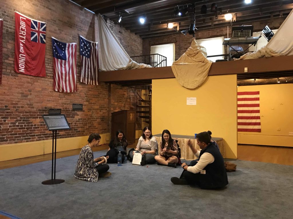 Group inside the Fraunces Tavern Museum in NYC with their private tour guide