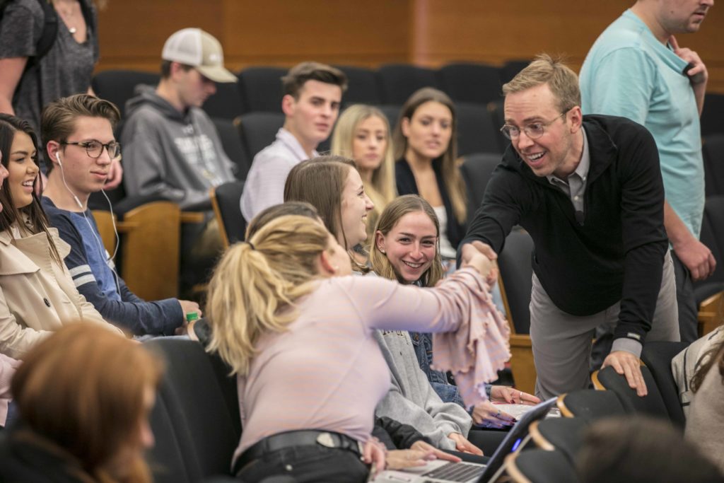 Nick Gray shake hands with students of Entrepreneurship at Wake Forest University