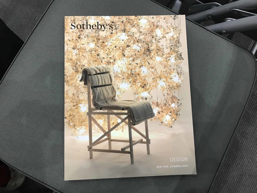 Nice catalog shows a chair and lights with Sotheby's up top