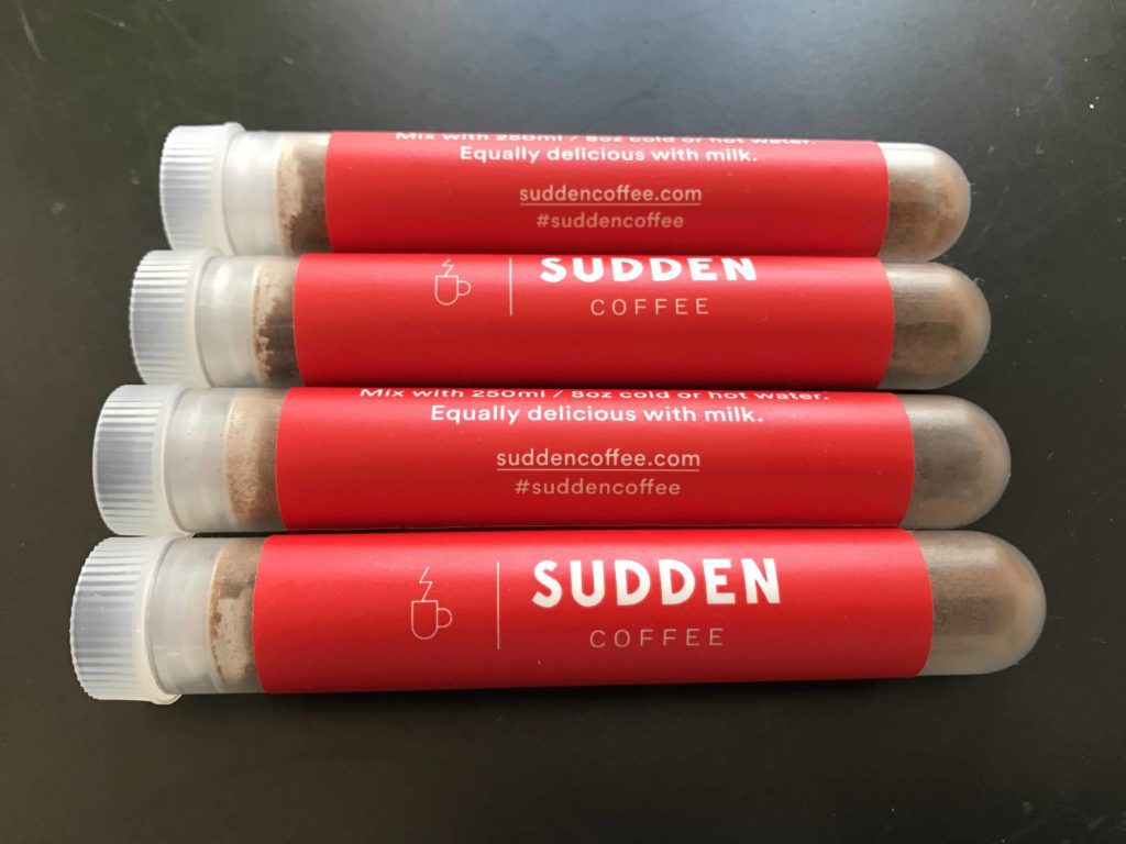 red tubes holding instant coffee from Sudden Coffee