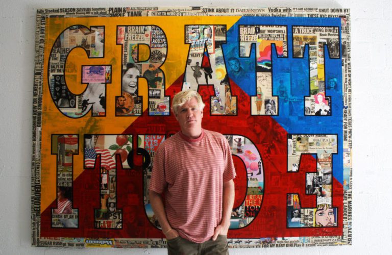 Peter Tunney in front of his artwork
