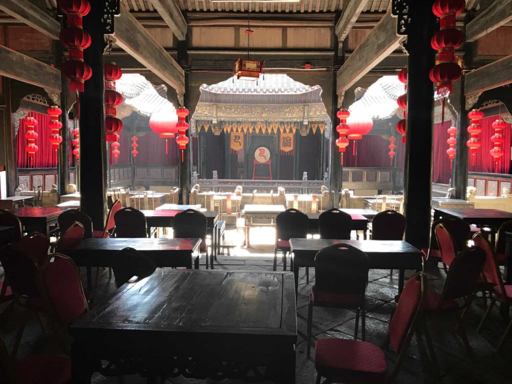 showing inside view of the Huguang Guild Hall in Chongqing China