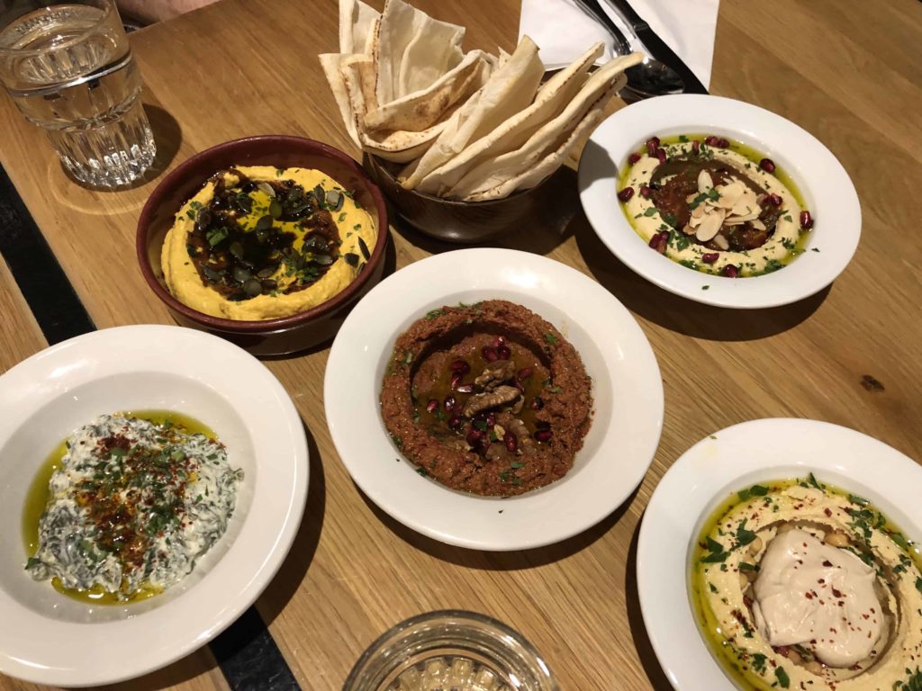 Small plates of hummus in Budapest