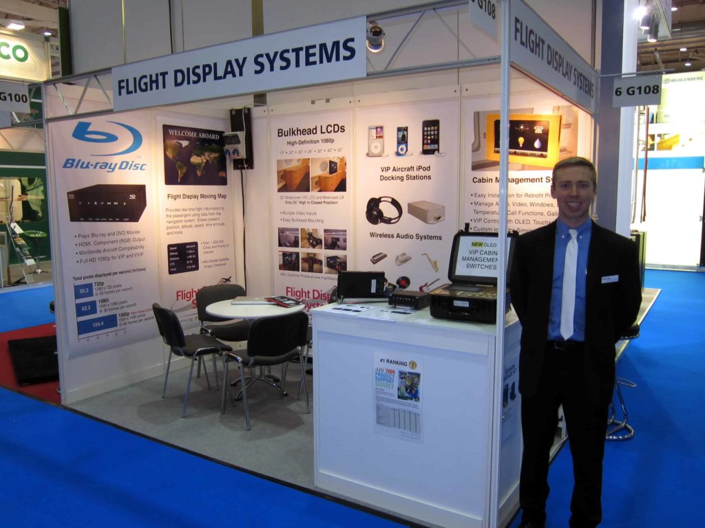Nick Gray at a trade show booth (AIX 2010)