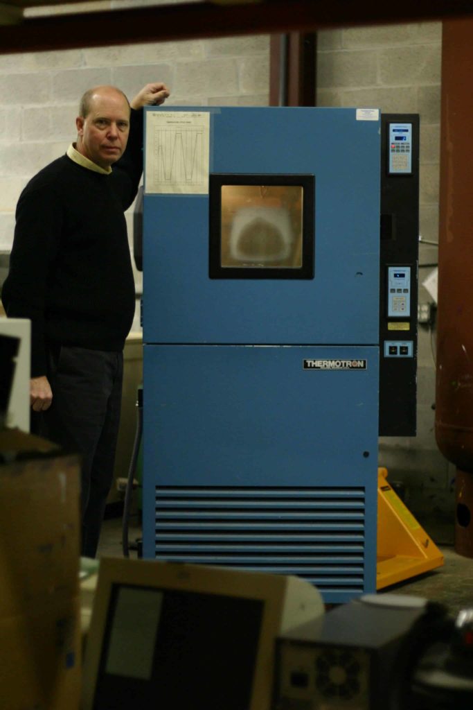 Thermotron blue color in warehouse with man
